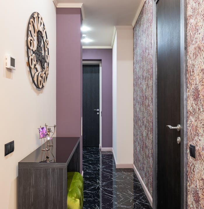 Explore this sleek and modern hallway featuring unique decor and a contemporary design.